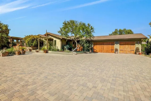 a view of a garden with an outdoor space