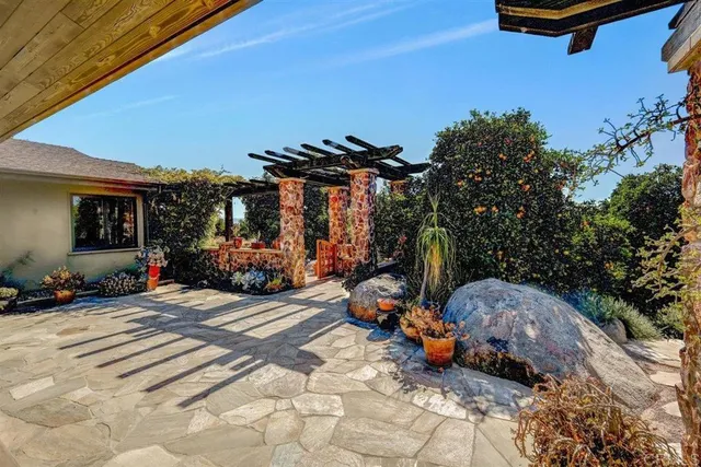 a kitchen with stainless steel appliances granite countertop a sink and a cabinets