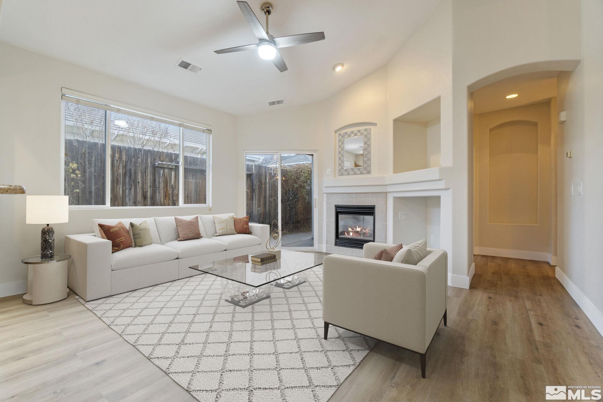 9725 Cattail Circle Reno, NV 89521 - Photo 3 of 38 a living room with furniture and a large window
