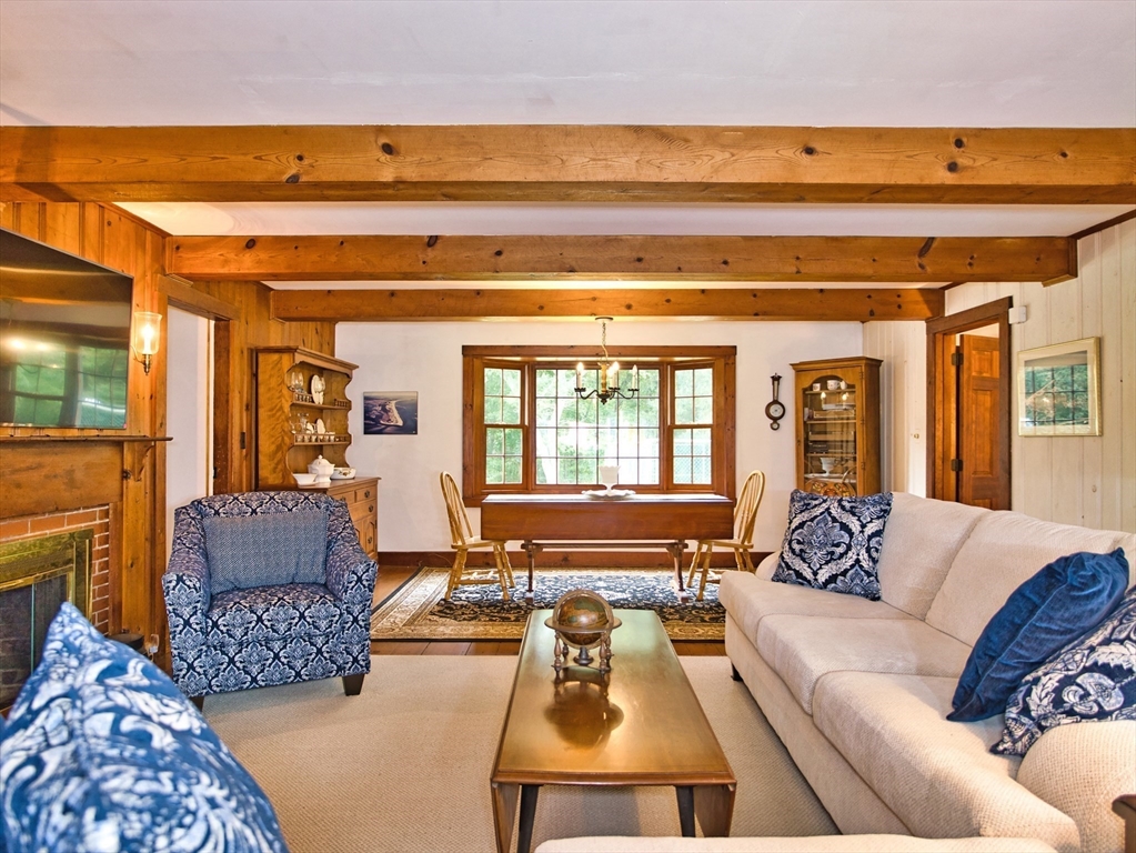 772 Gifford Road Westport, MA 02790 - Photo 12 of 37 a living room with furniture and a large window