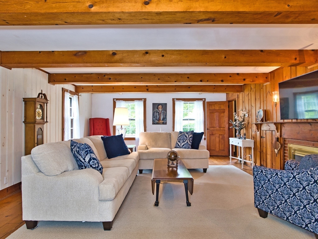 772 Gifford Road Westport, MA 02790 - Photo 14 of 37 a living room with furniture and a lamp