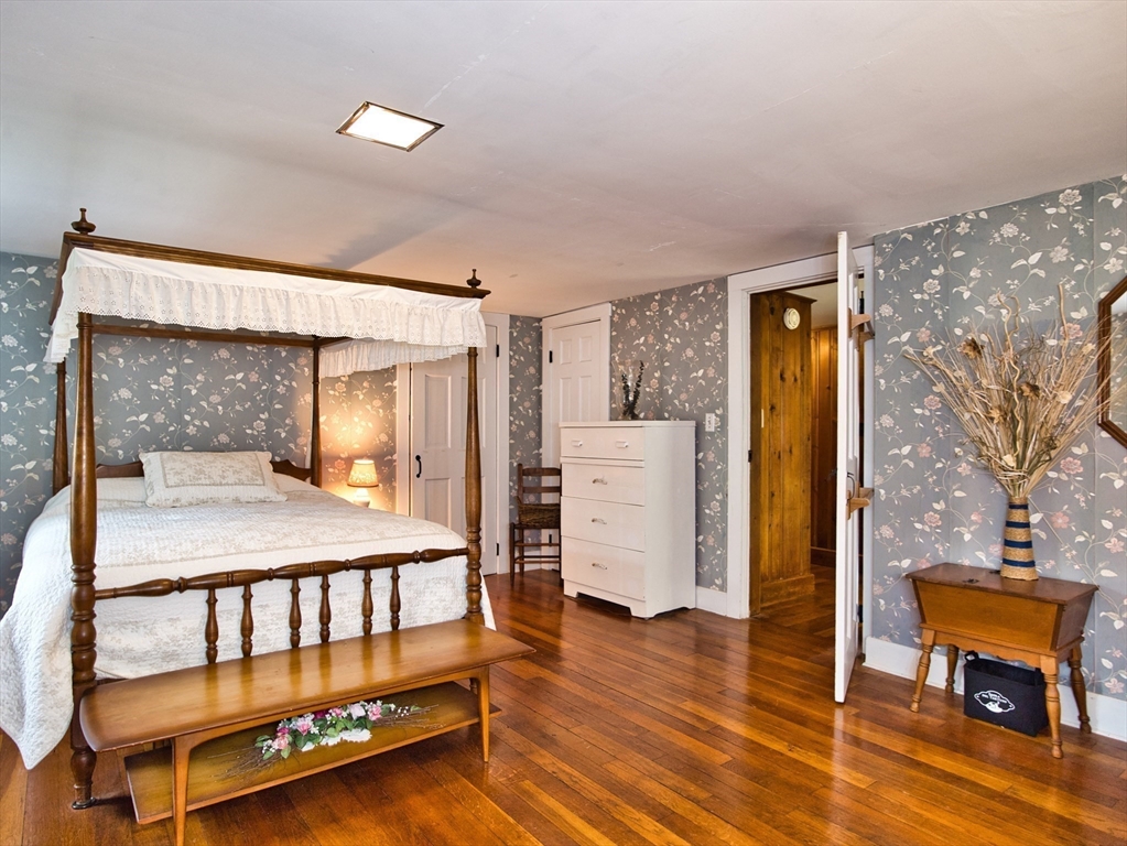 772 Gifford Road Westport, MA 02790 - Photo 25 of 37 a bedroom with furniture and wooden floor