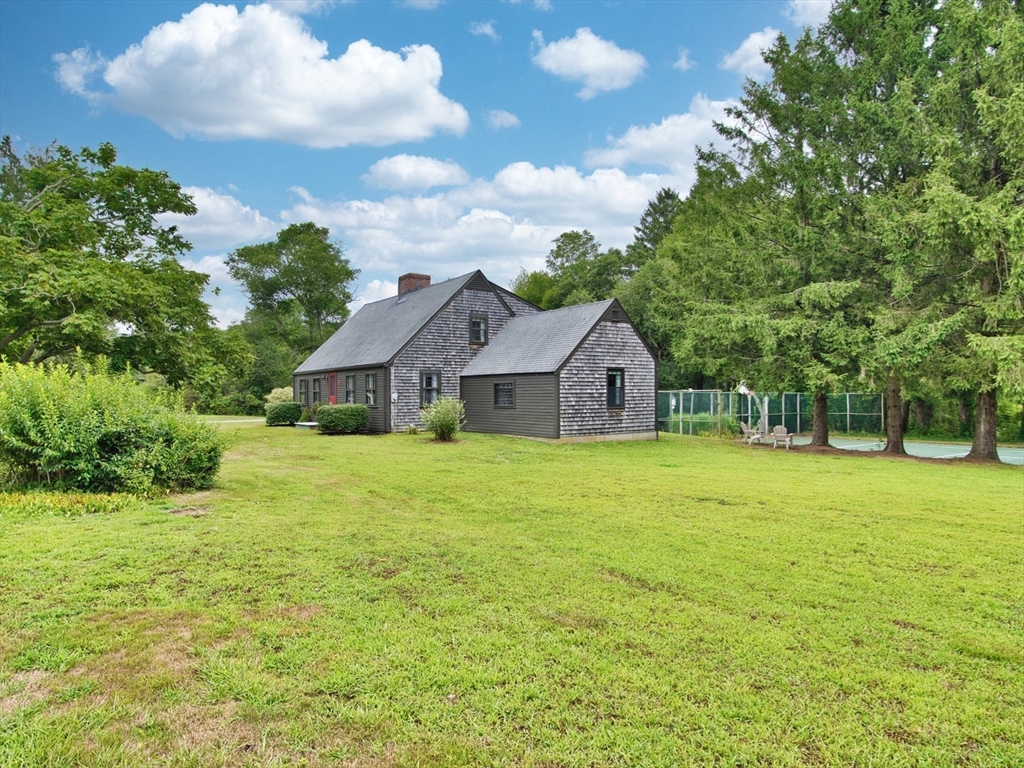772 Gifford Road Westport, MA 02790 - Photo 29 of 37 a front view of house with yard and green space