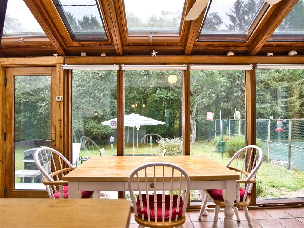 772 Gifford Road Westport, MA 02790 - Photo 8 of 37 a dining room with furniture water view and a floor to ceiling window