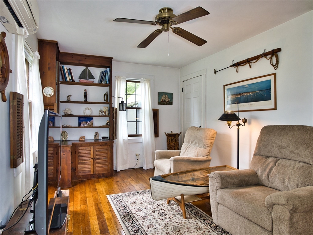 772 Gifford Road Westport, MA 02790 - Photo 9 of 37 a living room with furniture and a flat screen tv