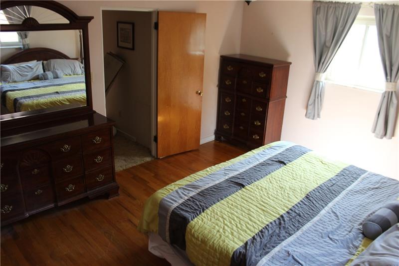 341 Orchard Spring Road Pittsburgh, PA 15220 - Photo 11 of 14 Master Bedroom 18 x 12