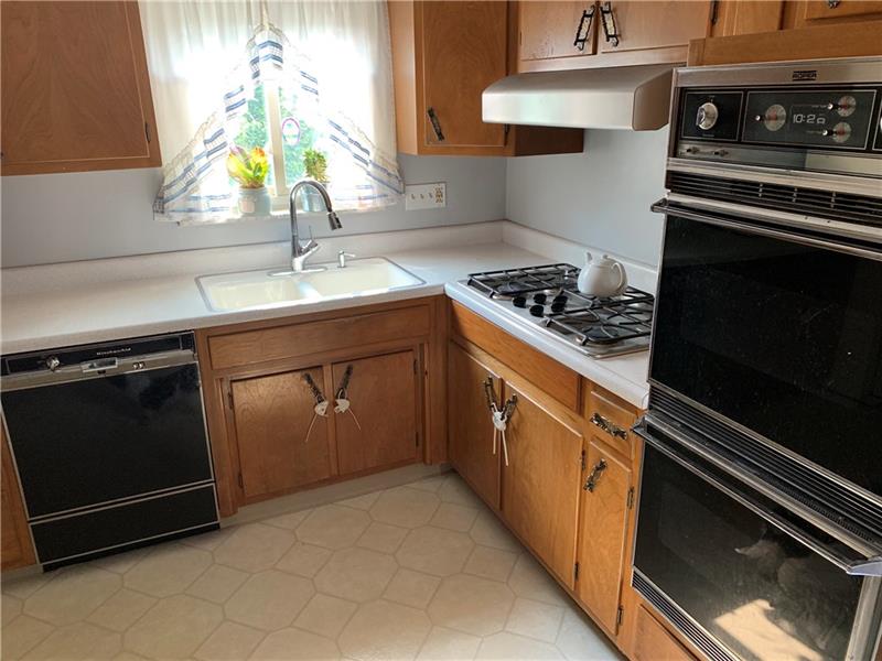 341 Orchard Spring Road Pittsburgh, PA 15220 - Photo 7 of 14 Eat in Kitchen with built in Oven, gas stove top and dishwasher