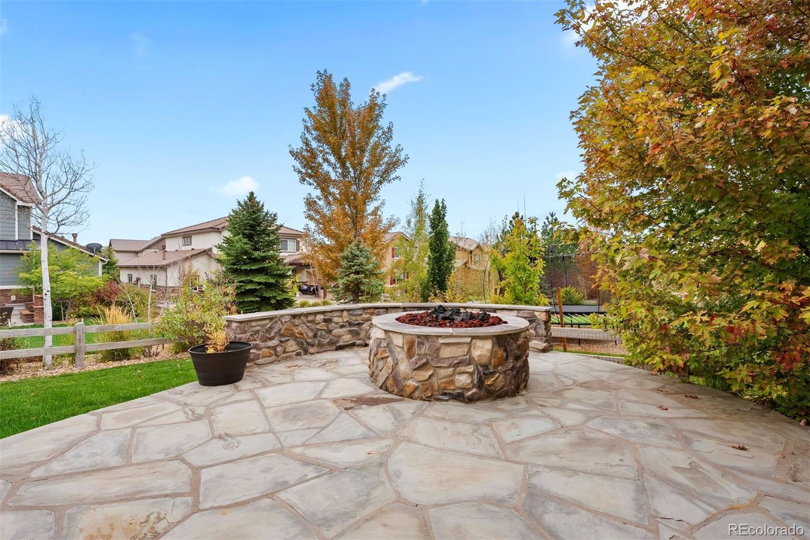 664 Tiger Lily Way Highlands Ranch, CO 80126 - Photo 39 of 47 a view of a backyard with sitting area