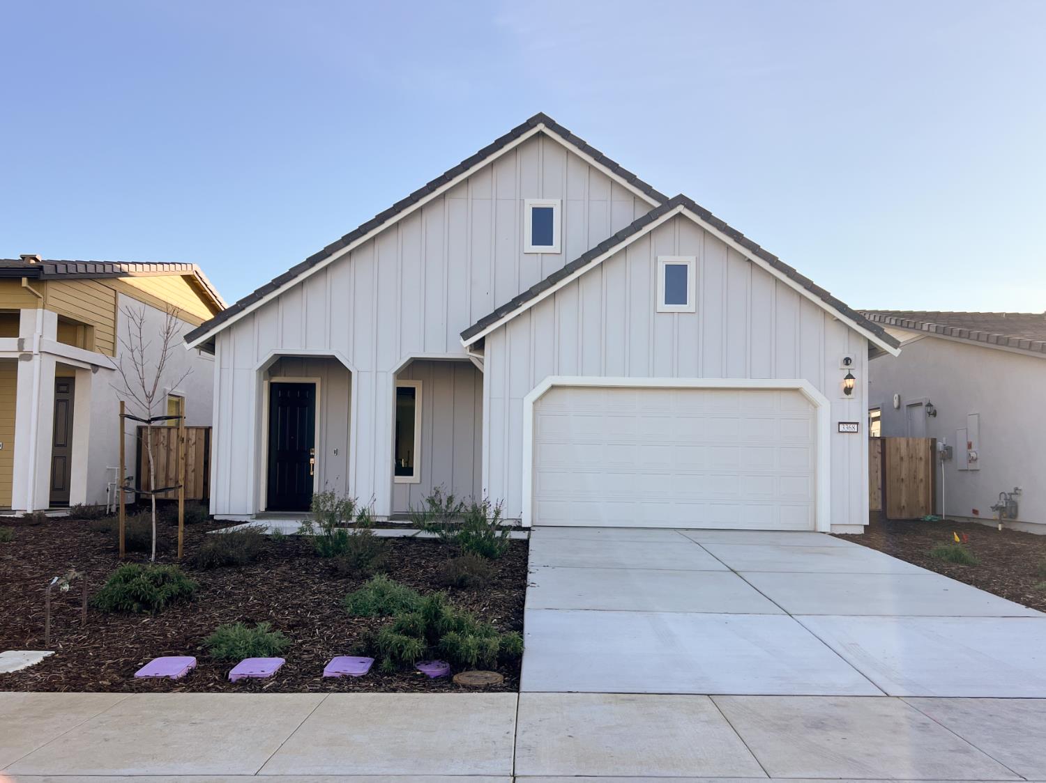 3368 Houser Court Davis, CA 95616 - Photo 1 of 19 a front view of a house with garage