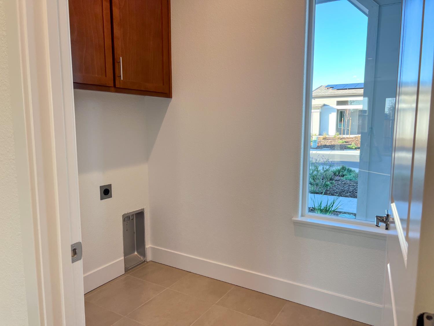 3368 Houser Court Davis, CA 95616 - Photo 17 of 19 a view of an empty room with a window