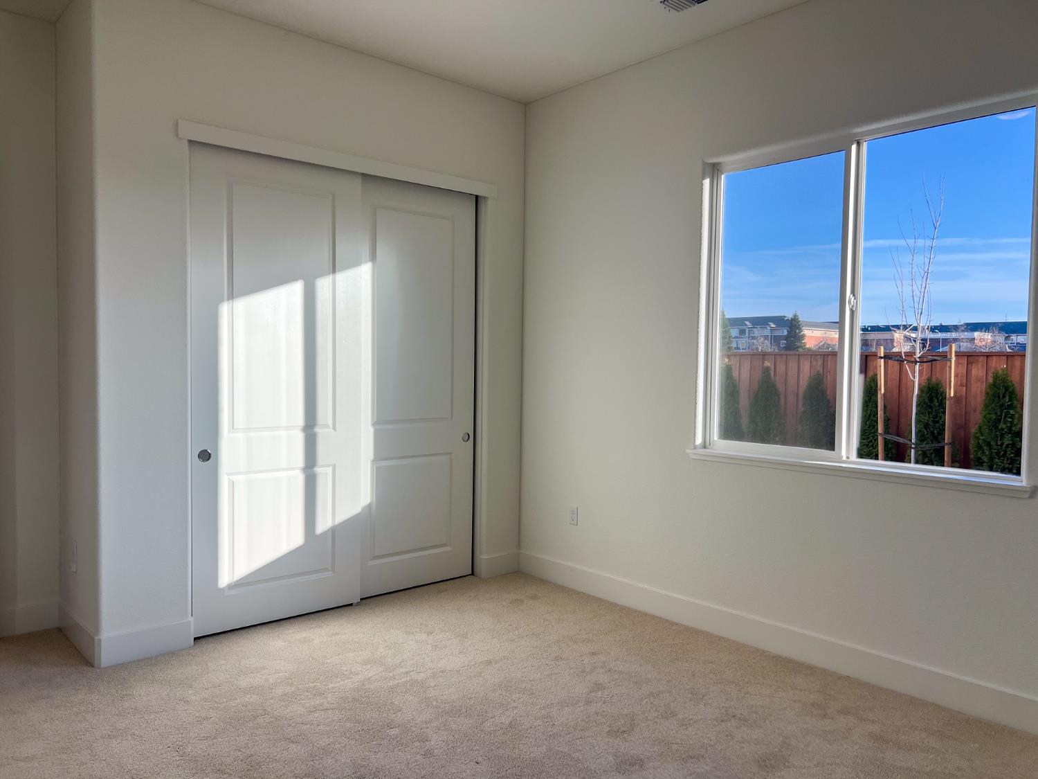 3368 Houser Court Davis, CA 95616 - Photo 8 of 19 a view of an empty room with a window