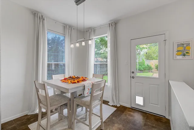 a table and chairs in a room