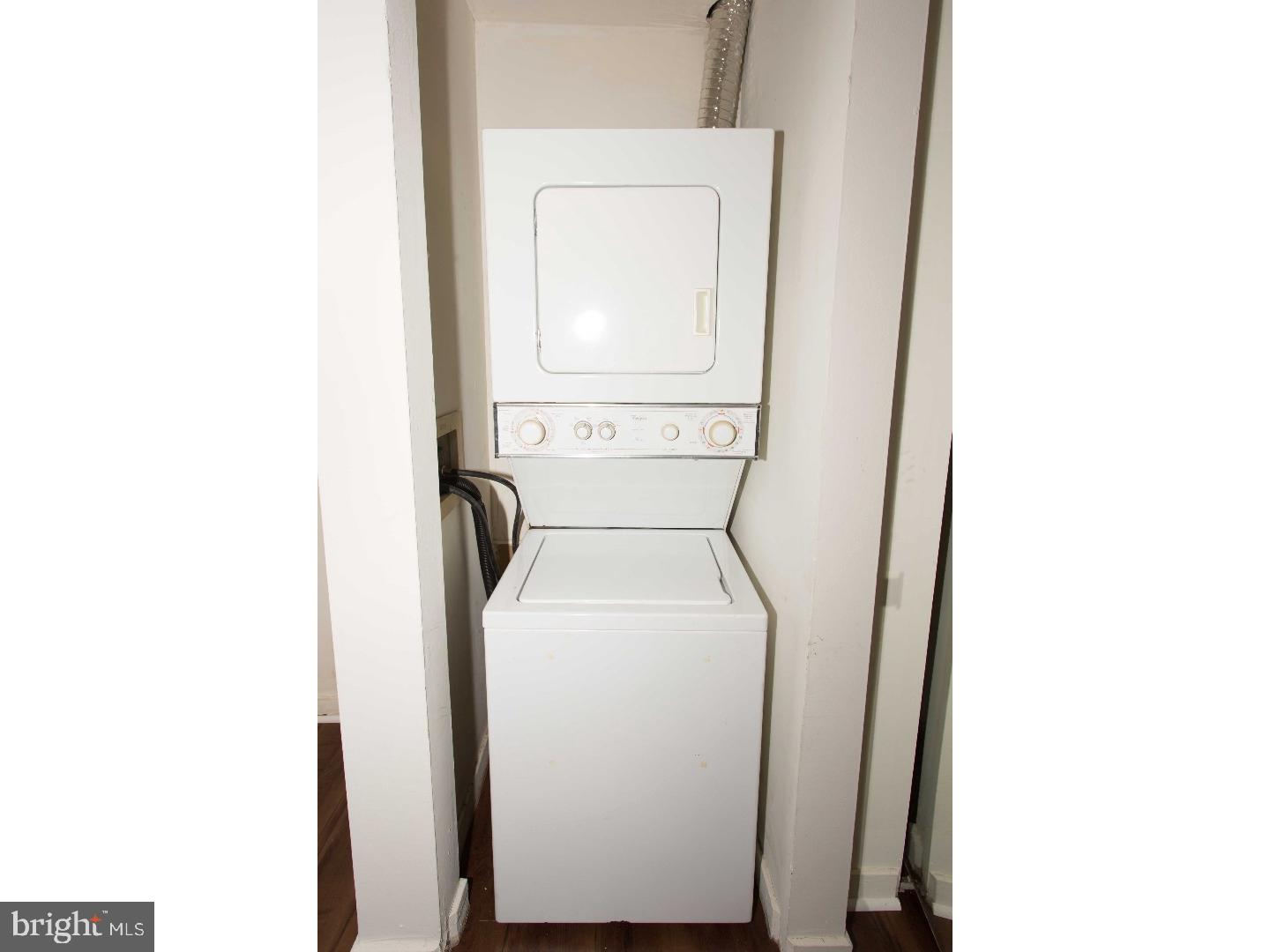 130 Arch Street, Unit 104 Philadelphia, PA 19106 - Photo 19 of 22 a utility room with dryer and washer