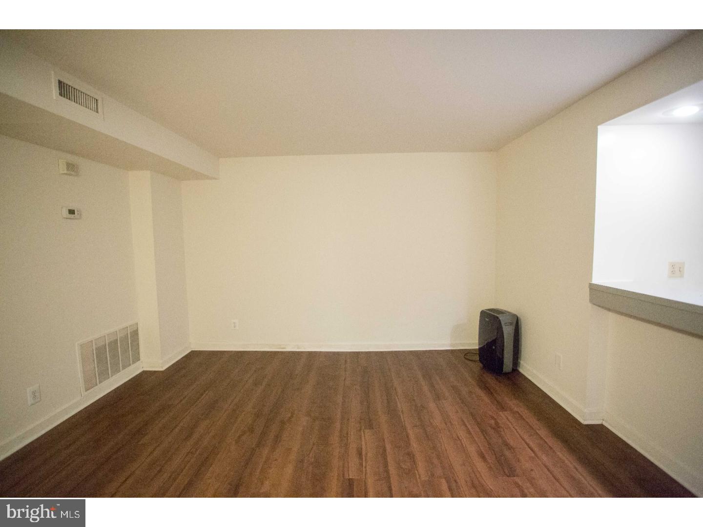 130 Arch Street, Unit 104 Philadelphia, PA 19106 - Photo 8 of 22 a view of wooden floor in a room