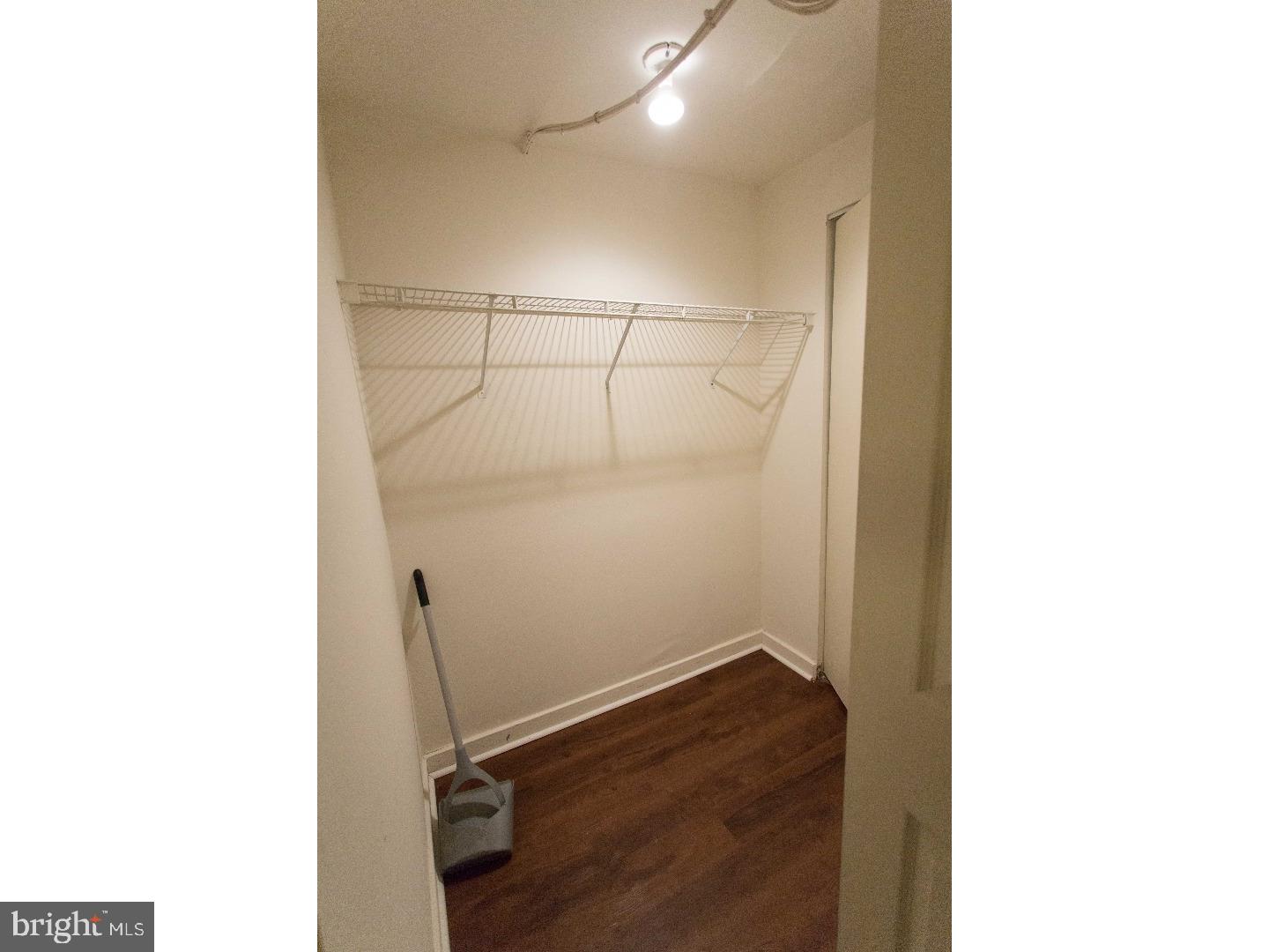 130 Arch Street, Unit 104 Philadelphia, PA 19106 - Photo 9 of 22 a bathroom with a sink and a mirror