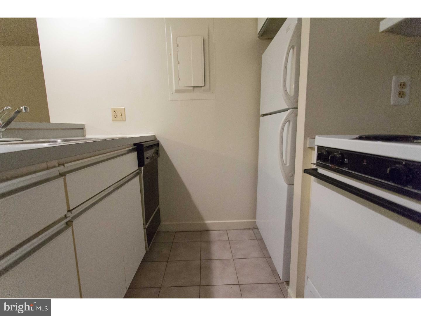 130 Arch Street, Unit 104 Philadelphia, PA 19106 - Photo 10 of 22 a utility room with dryer and washer