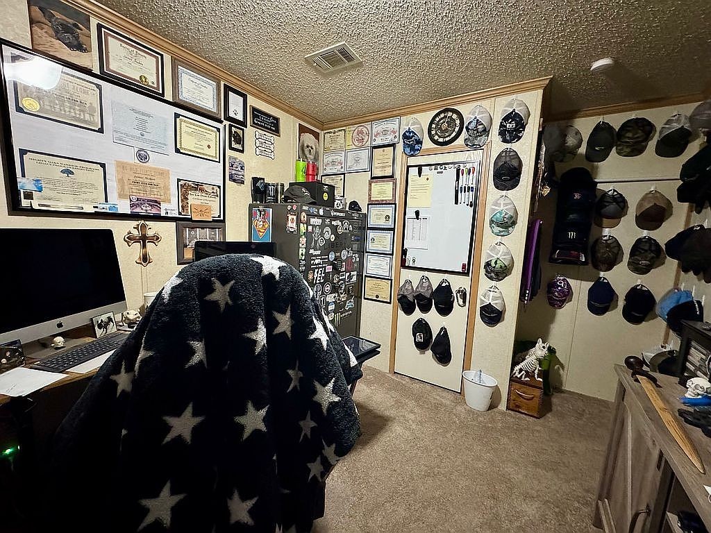 3351 East State Line Road Union City, TN 38261 - Photo 17 of 36 a front view of a house with lots of stuff