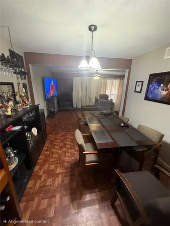 a room with furniture pool table and window