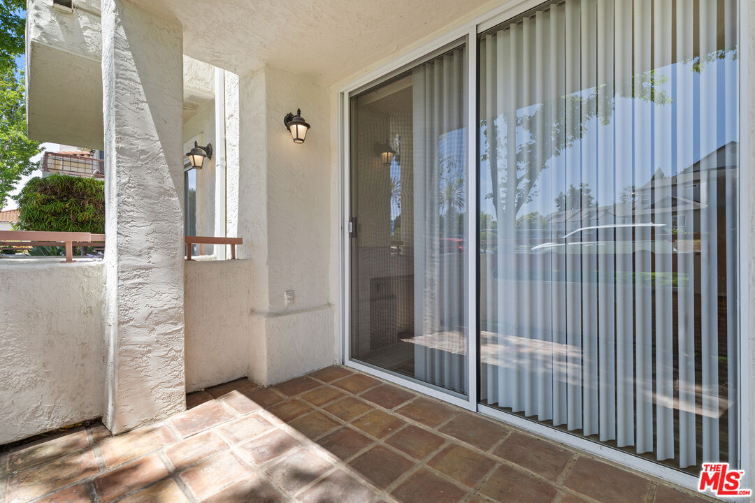 445 Ribbon Beach Way, Unit 277 Oceanside, CA 92058 - Photo 18 of 28 a view of a balcony with door