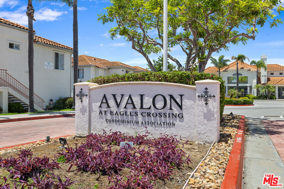 445 Ribbon Beach Way, Unit 277 Oceanside, CA 92058 - Photo 2 of 28 a sign on the side of a street