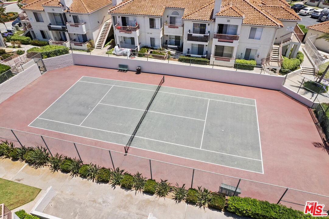 445 Ribbon Beach Way, Unit 277 Oceanside, CA 92058 - Photo 26 of 28 a swimming pool with outdoor seating and yard