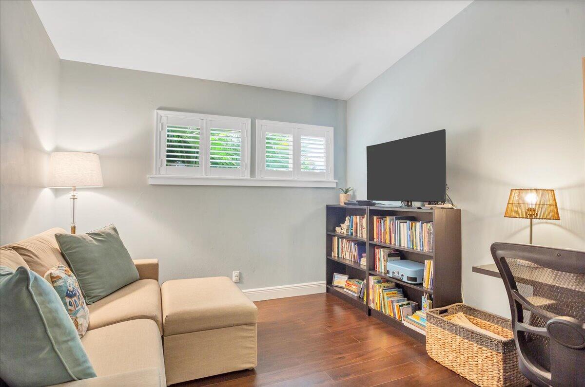 1110 Southwest 15th Street Boca Raton, FL 33486 - Photo 21 of 41 a living room with furniture and a flat screen tv
