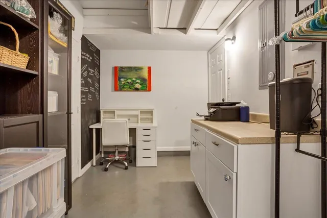 a view of a hallway with workspace