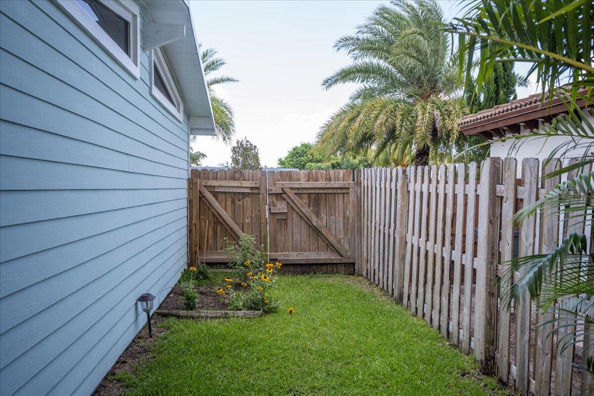 1110 Southwest 15th Street Boca Raton, FL 33486 - Photo 28 of 41 a view of a backyard with a garden