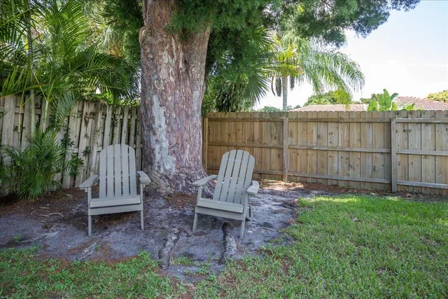 a garden view with a seating space