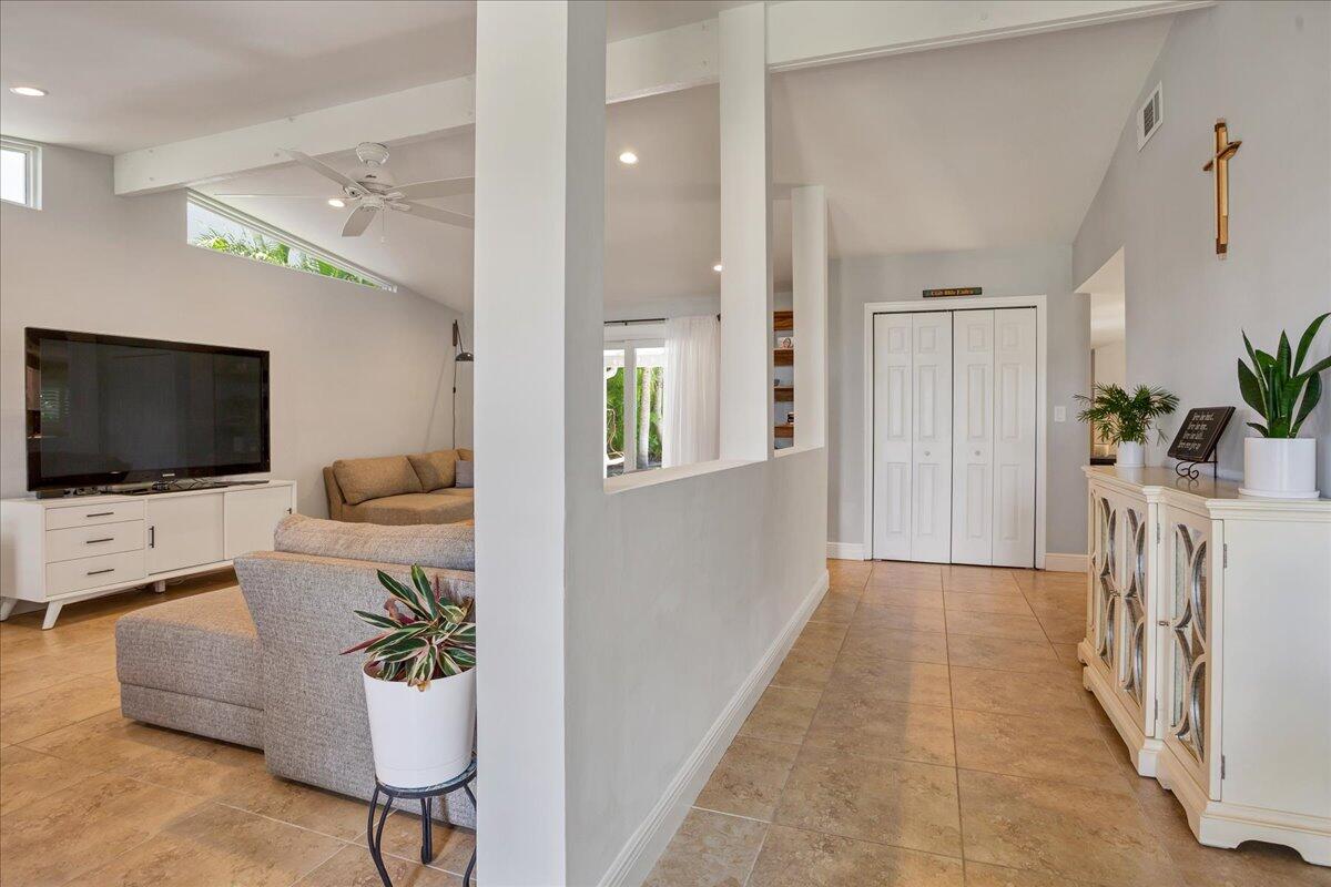 1110 Southwest 15th Street Boca Raton, FL 33486 - Photo 4 of 41 a living room with furniture and a flat screen tv