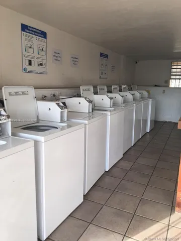 a utility room with washer and dryer