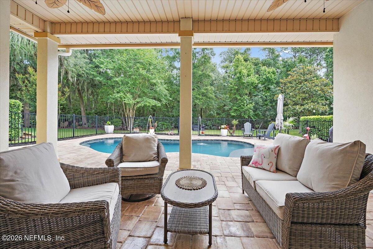 280 Edge Of Woods Road St. Augustine, FL 32092 - Photo 2 of 29 09-Lanai to Pool
