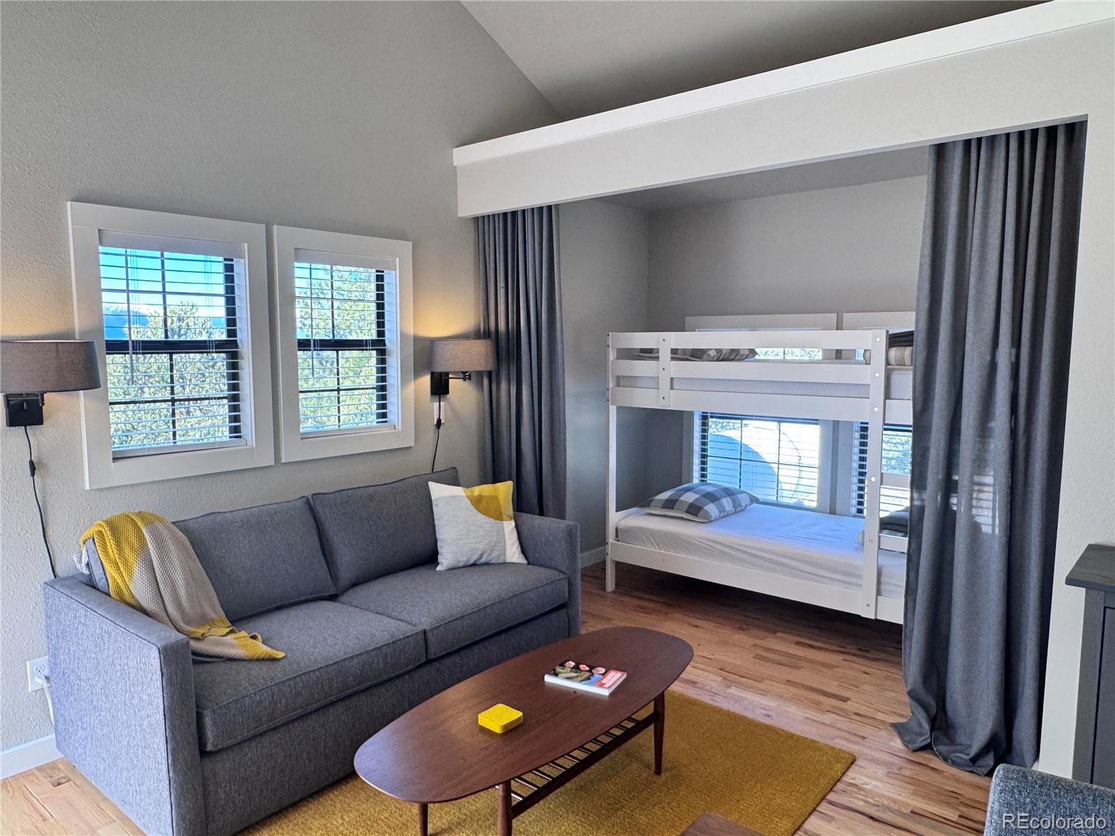 563 Kankakee Road Westcliffe, CO 81252 - Photo 33 of 46 a living room with furniture and a window