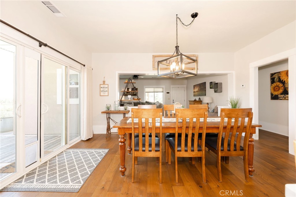 6488 County Road 20 Orland, CA 95963 - Photo 15 of 73 a view of a dining room with furniture window and wooden floor