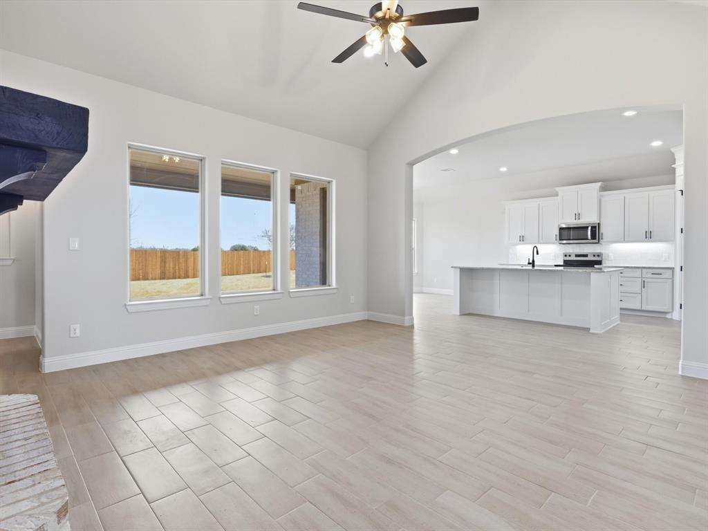 829 Haley Springtown, TX 76082 - Photo 8 of 37 a view of a kitchen with microwave and cabinets