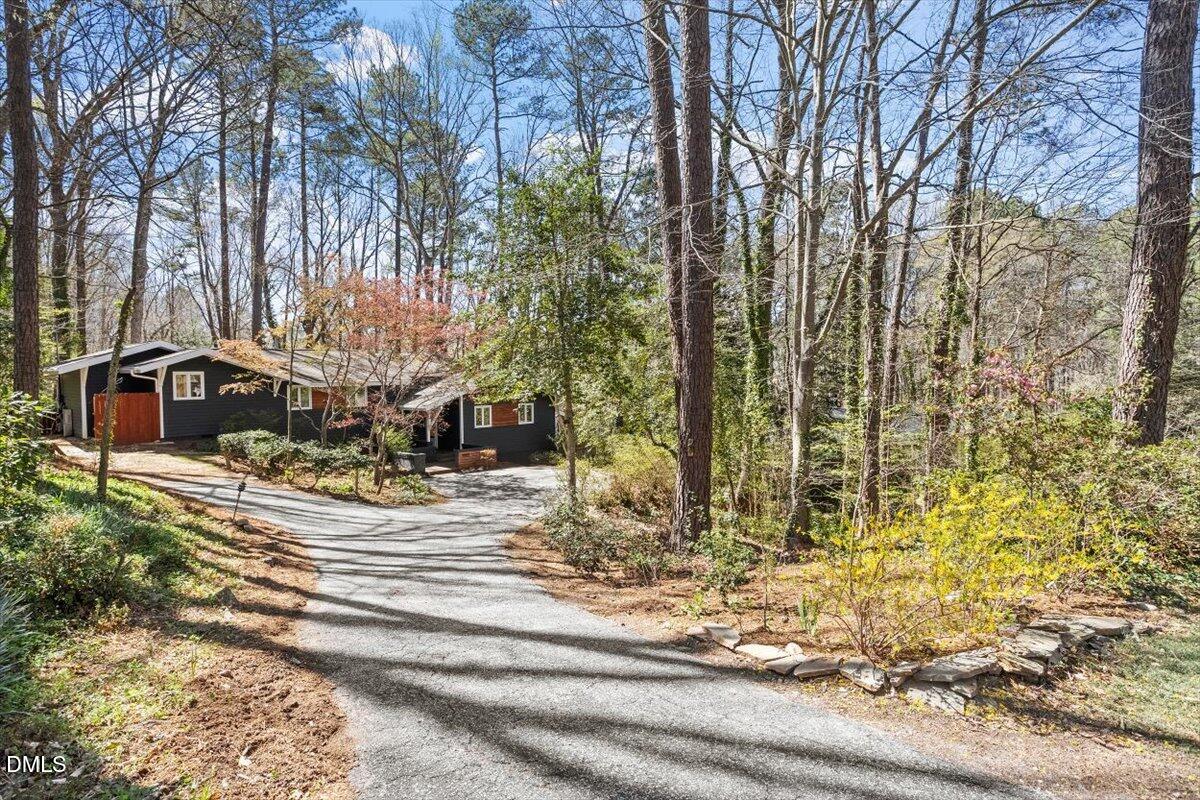 4805 Rembert Drive Raleigh, NC 27612 - Photo 35 of 45 a view of street with large trees