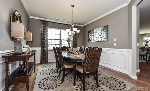 4308 Perth Road, Unit 320 Indian Land, SC 29707 - Photo 4 of 11 a view of a dining room with furniture
