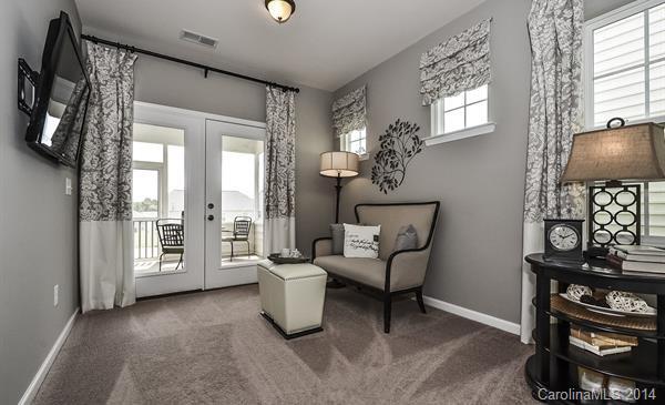 4308 Perth Road, Unit 320 Indian Land, SC 29707 - Photo 6 of 11 a view of a livingroom with furniture and a window