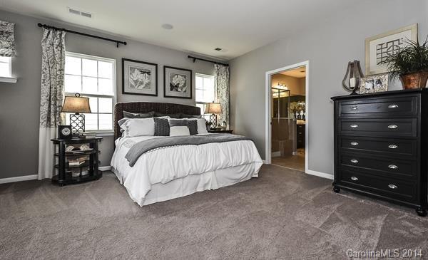 4308 Perth Road, Unit 320 Indian Land, SC 29707 - Photo 7 of 11 a bedroom with a bed and a window