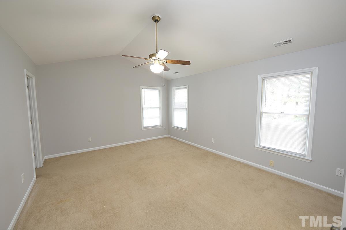 405 Lippershey Court Cary, NC 27513 - Photo 11 of 17 a view of an empty room with a window