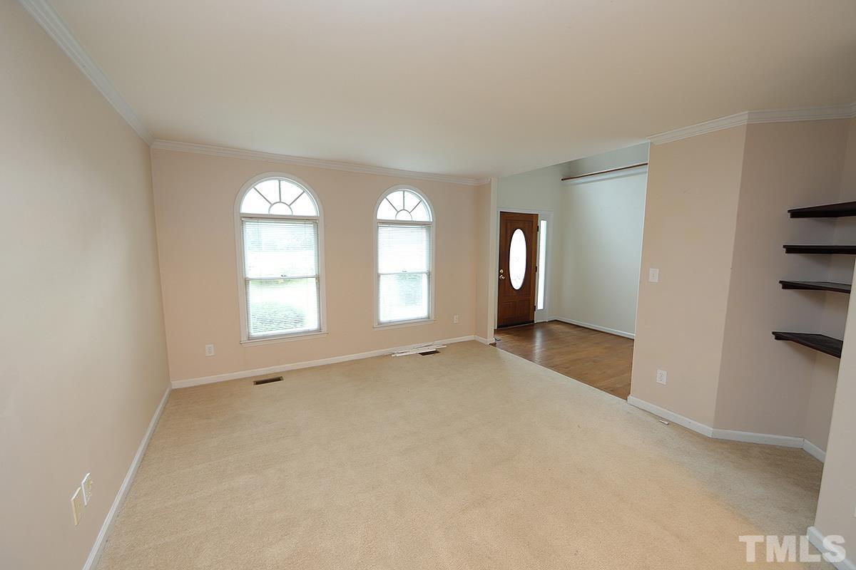 405 Lippershey Court Cary, NC 27513 - Photo 3 of 17 an empty room with windows and closet