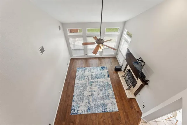 a living room with a rug