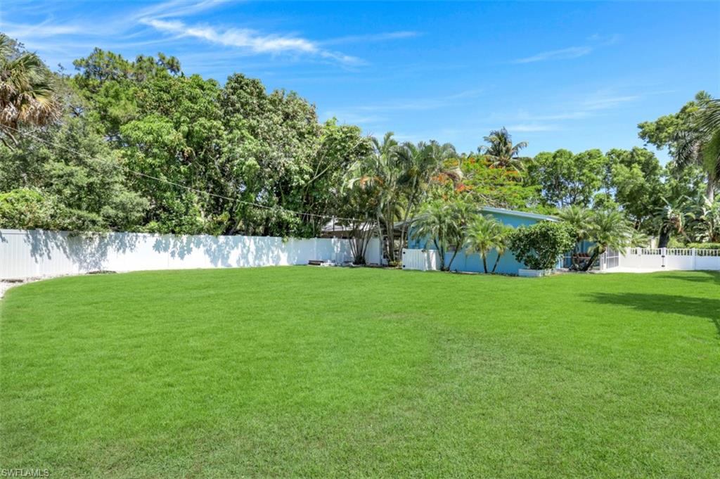 409 3rd Avenue North Naples, FL 34102 - Photo 40 of 41 a view of yard with green space