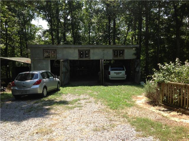 1100 Timber Ridge Road Charlotte, TN 37036 - Photo 10 of 19 Large garage with plenty of storage.