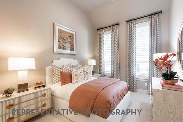 a bedroom with bed and window