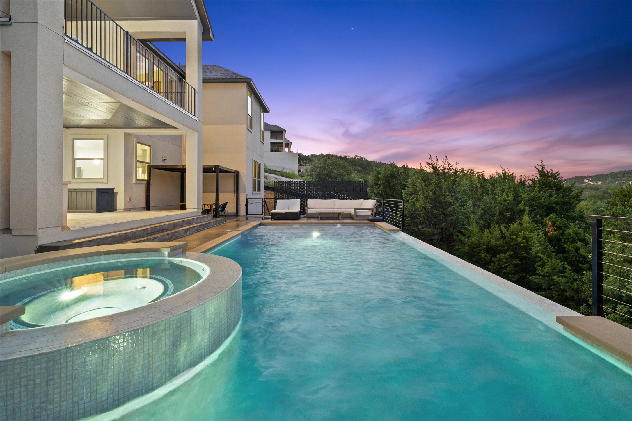 2220 Normandy View Leander, TX 78641 - Photo 1 of 1 View of swimming pool with a patio area, a balcony, and a pool with connected hot tub
