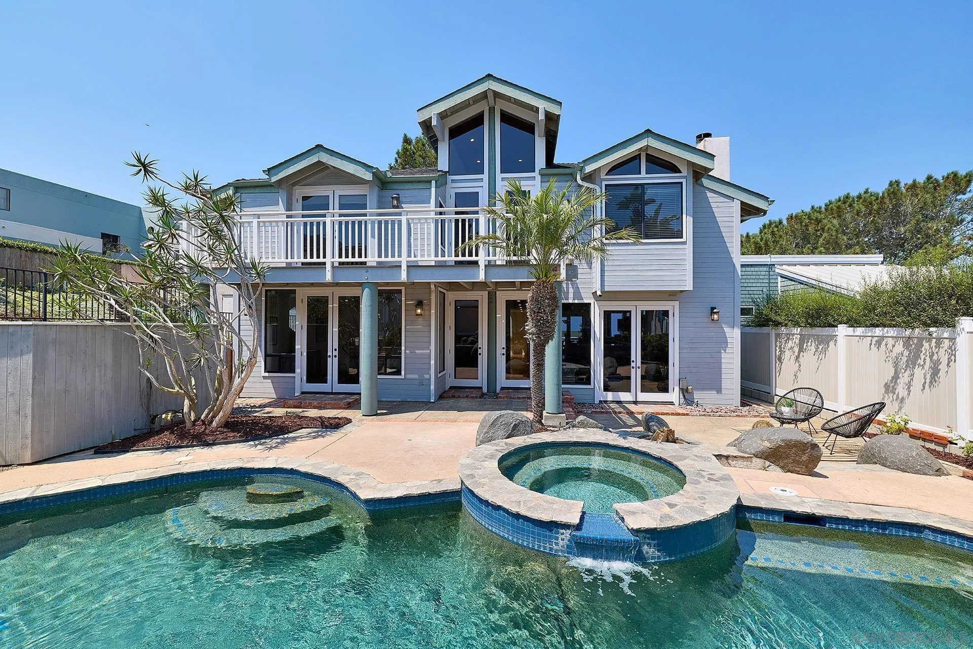 13765 Condesa Drive Del Mar, CA 92014 - Photo 51 of 75 a front view of a house with swimming pool having outdoor seating