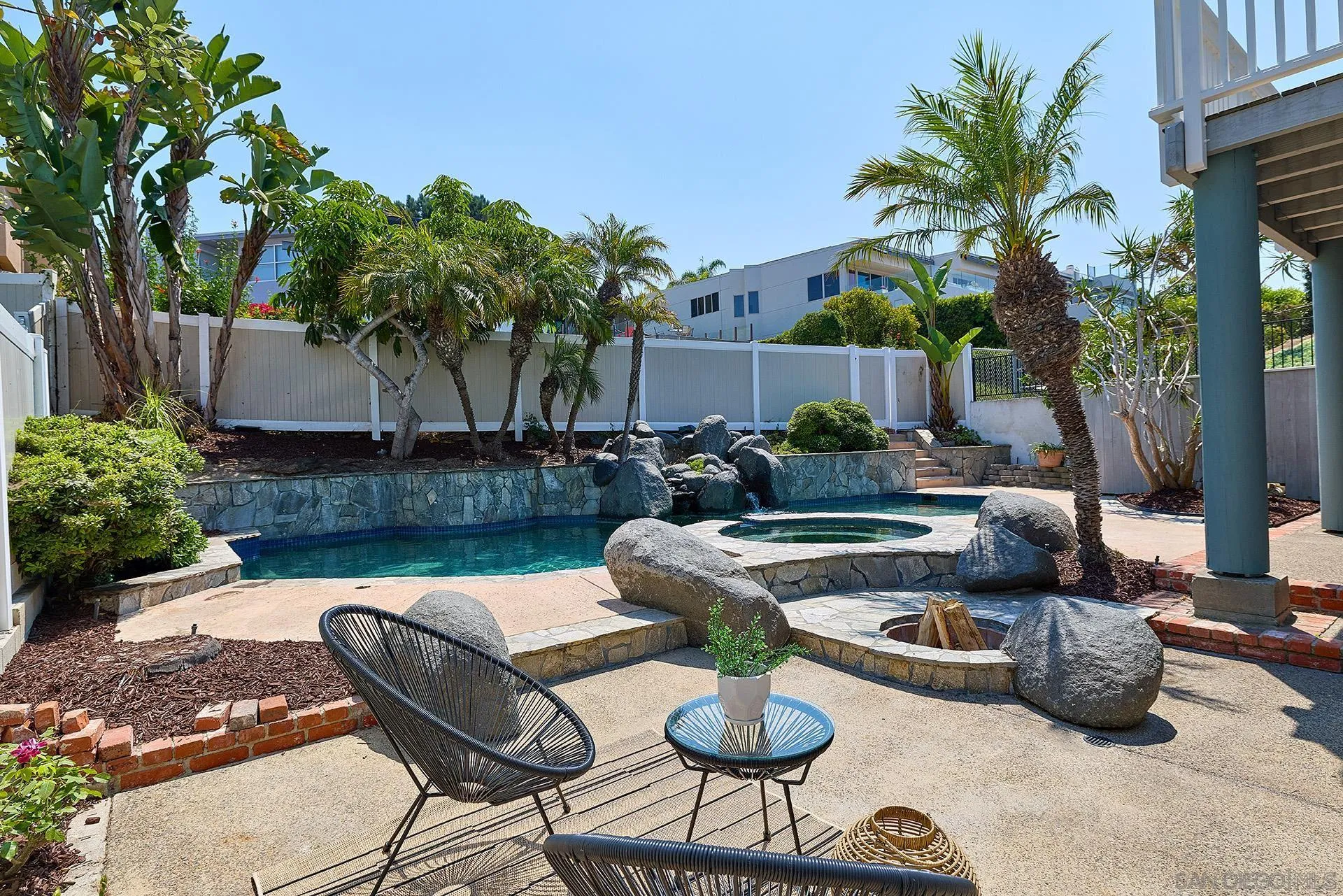 13765 Condesa Drive Del Mar, CA 92014 - Photo 53 of 75 a view of a backyard with furniture and a fire pit