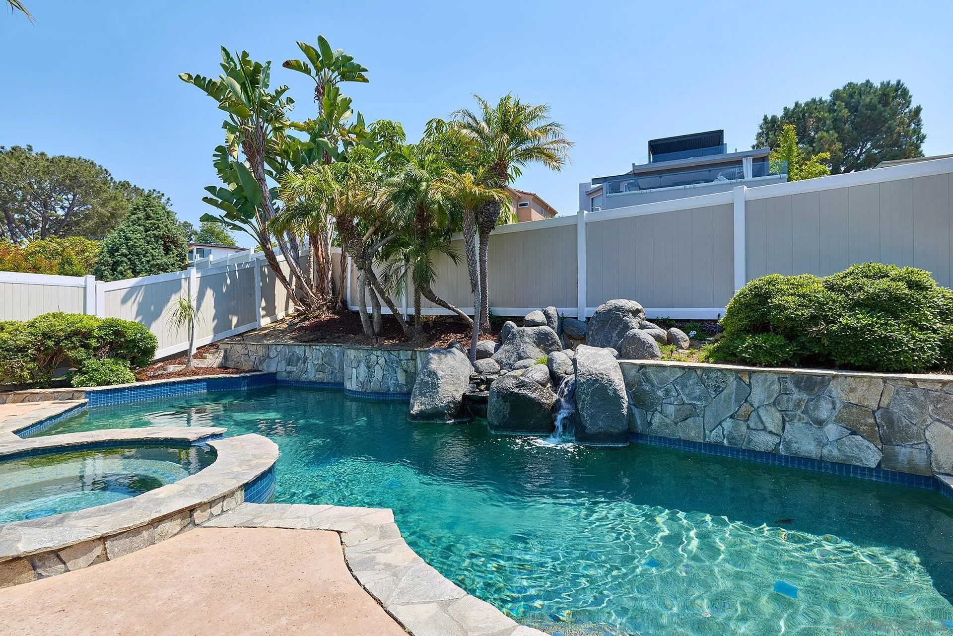 13765 Condesa Drive Del Mar, CA 92014 - Photo 55 of 75 a view of backyard with outdoor seating and green bushes