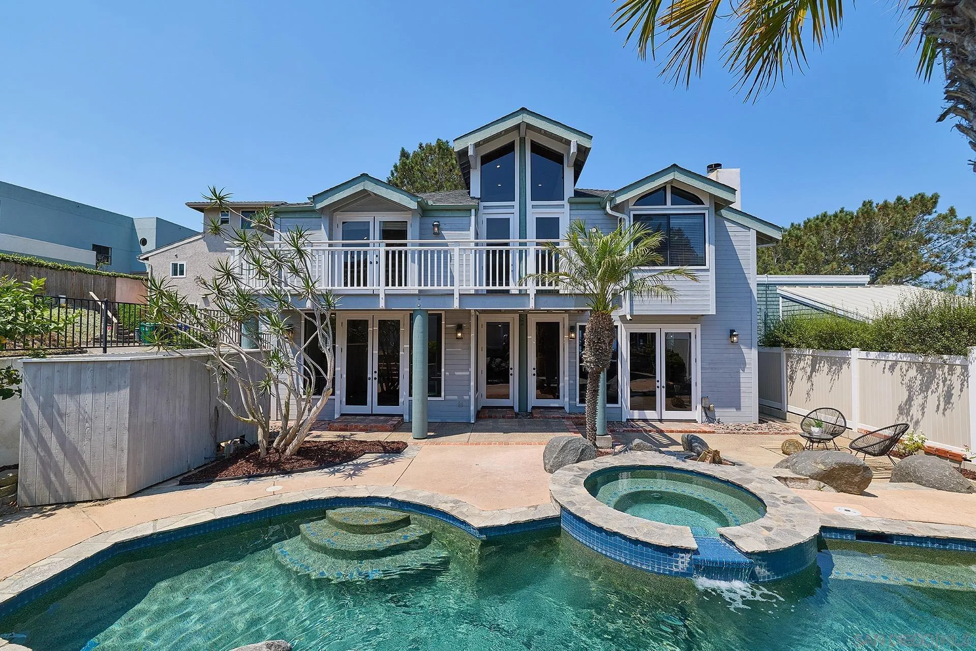 13765 Condesa Drive Del Mar, CA 92014 - Photo 56 of 75 a view of a house with swimming pool and sitting area